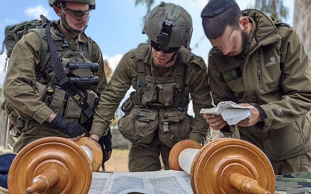 Jewish soldiers are celebrating the joyous holiday of Simchat Torah. Jewish soldiers are celebrating the joyous holiday of Simchat Torah.