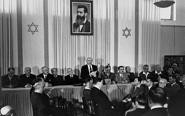 David Ben-Gurion, the first Prime Minister of Israel, publicly proclaimed the Declaration of the Establishment of the State of Israel on May 14, 1948, in Tel Aviv. The ceremony took place in the old Tel Aviv Museum of Art on Rothschild Street, beneath a large portrait of Theodor Herzl, the founder of modern political Zionism. (Wikipedia)