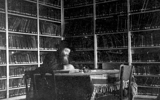 Rabbi Meir Shapiro sits in the library of the Chachmei Lublin Yeshiva. (Courtesy Grodzka Gate-NN Theater Center)