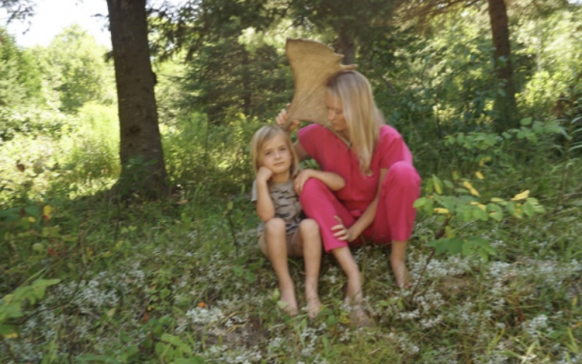 Karin and her son in Bearland. Listening to the wind is a state of mind.