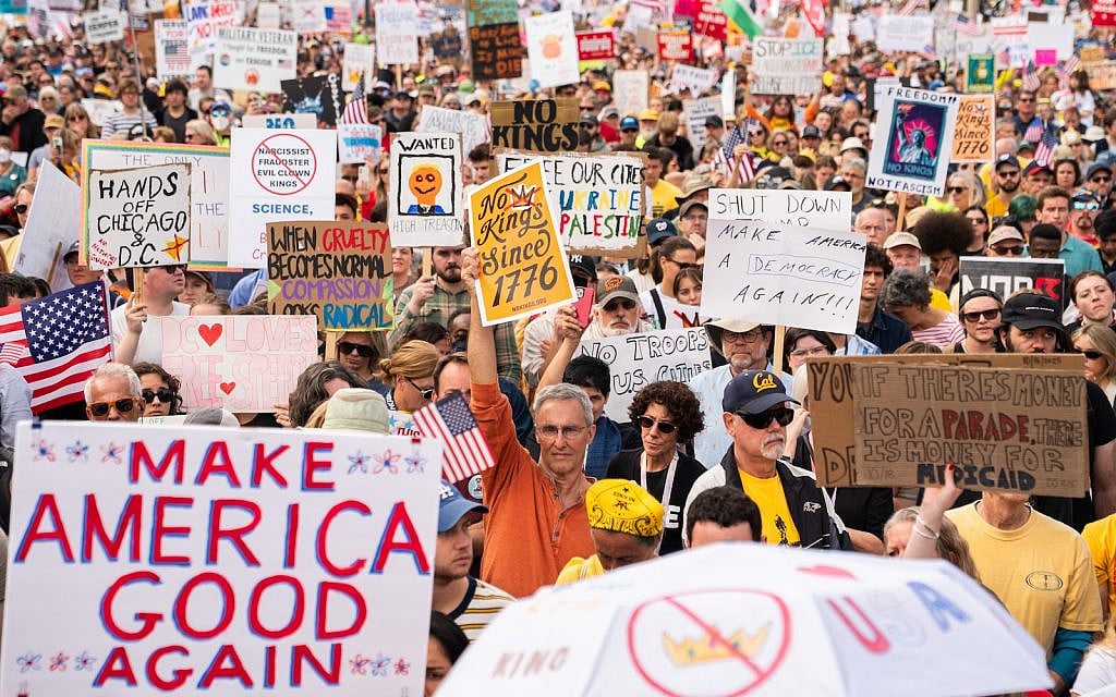 Crowds gather to listen to Sen. Bernie Sanders, I-Vt., during a No Kings protest, Saturday, Oct. 18, 2025, in Washington. (AP Photo/Allison Robbert)