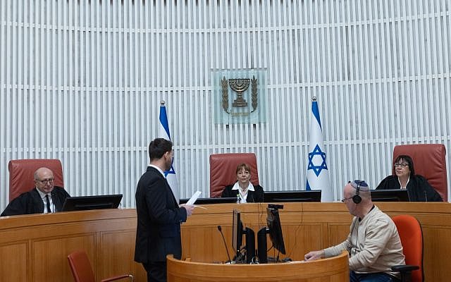 Supreme court Judges Yael Willner (ctr), Alex Stein (L) and Gila Canfy-Steinitz preside at a court hearing on who will have authority over the Sde Teiman leak probe, at the Supreme Court in Jerusalem. November 11, 2025. (Yonatan SIndel/Flash90)
