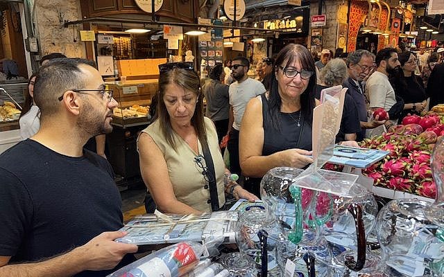 Israelis shopping  in Mahanei Yehuda Market, Jerusalem