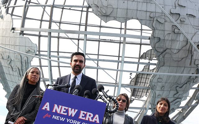 New York City mayor-elect Zohran Mamdani, alongside his mayoral transition team, speaks during a news conference at Flushing Meadows Corona Park in Queens, NY, on November 5, 2025. (Timothy A. Clary/ AFP) New York City mayor-elect Zohran Mamdani, alongside his mayoral transition team, speaks during a news conference at Flushing Meadows Corona Park in Queens, NY, on November 5, 2025. (Timothy A. Clary/ AFP)