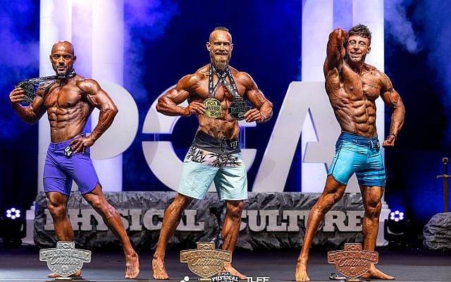 On stage at the Israeli Physical Culture Assocaition bodybuilding competition. Courtesy Oleg Nikolaev.
