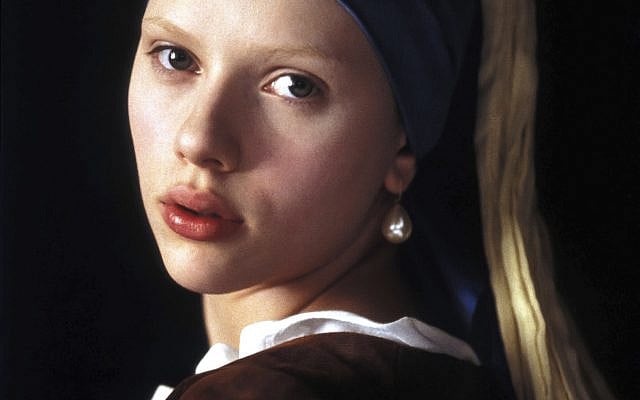 Seventeen-year-old Scarlett Johannson, photographed and lit to resemble Vermeer’s iconic painting in Girl With a Pearl Earring (Peter Webber, 2003)—and very aware of our presence as viewers. Image courtesy of Reel Art Press