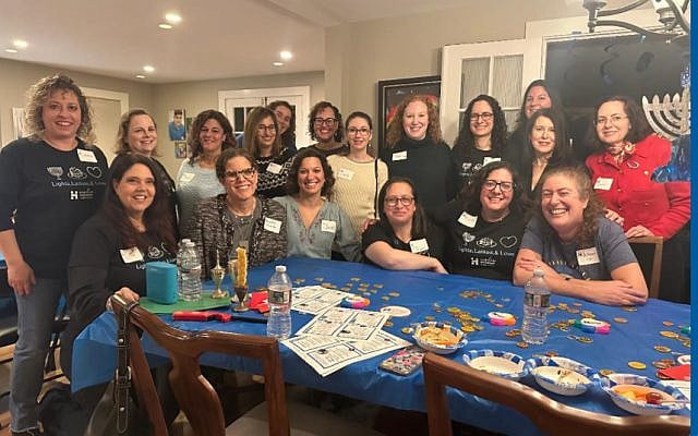 Members of Hadassah Northeast's Evolve program celebrating Hanukkah together in December 2024. Photo supplied by the author who is seated in the first row on the far right.