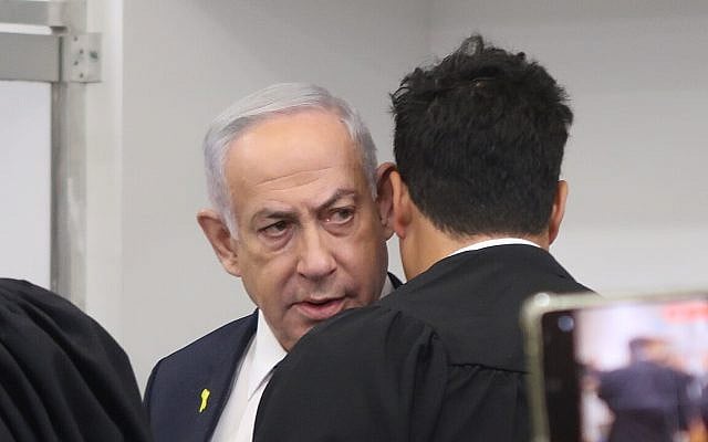 Benjamin Netanyahu in court with his lawyer, Amit Hadad