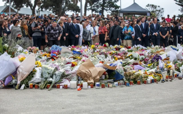 Flowers and candles placed near the site of the mass shooting at Bondi Beach in Sydney on Dec. 15. Photographer: Brent Lewin/Bloomberg
