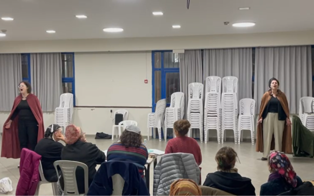 Rivka Deray (playing King Shaul, L) and Michal Lourenco (playing Yonatan, R) rehearse 'I Will Obey' from David The Servant King. (courtesy)