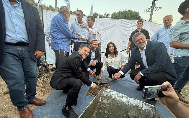 (From L-R) Finance Minister Bezalel Smotrich, Yesha Council chairman Yisrael Ganz, Transportation Minister Miri Regev and Likud MK Avichai Boaron at a ceremony marking the establishment of a new settlement in the southern West Bank called Mitzpe Ziv on June 10, 2025. (Courtesy)