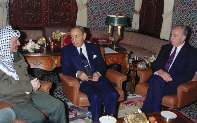 Morocco’s King Hassan II (center) speaks with PLO leader Yasser Arafat and Israeli foreign minister Shimon Peres in the King’s Palace in Rabat, Morocco, 1995.
Credit: REUTERS
