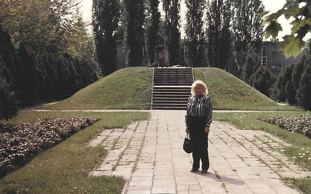 Edna Stefania Brill – Warsaw, 1989 Standing at the Mila 18 memorial, site of the Warsaw Ghetto Uprising command bunker. The mound was built from the stones of her childhood home.