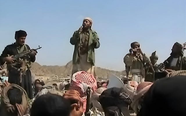 A group of al-Qaeda in the Arabian Peninsula members giving a speech at al-Majalah, 2009 (Wikimedia Commons).