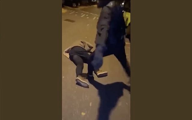 Screenshot from a video showing the assault of a fan of Maccabi Tel Aviv following a soccer game in Amsterdam on November 8, 2024. (X screenshot; used in accordance with Clause 27a of the Copyright Law)