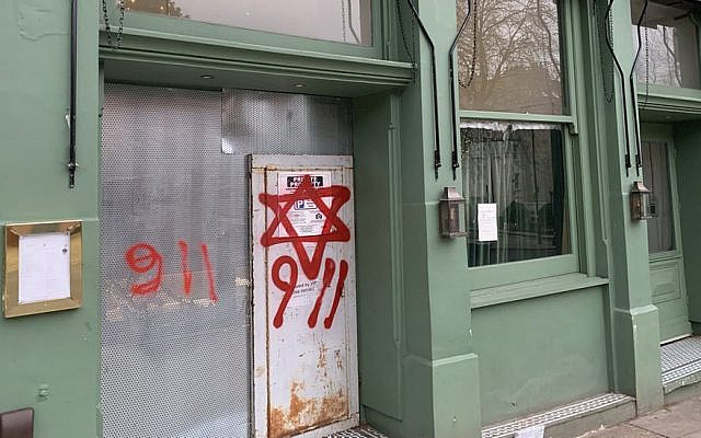 Antisemitic graffiti on a synagogue in London. Photo © Garry Knight, licensed under CC BY 2.0, via Wikimedia Commons.