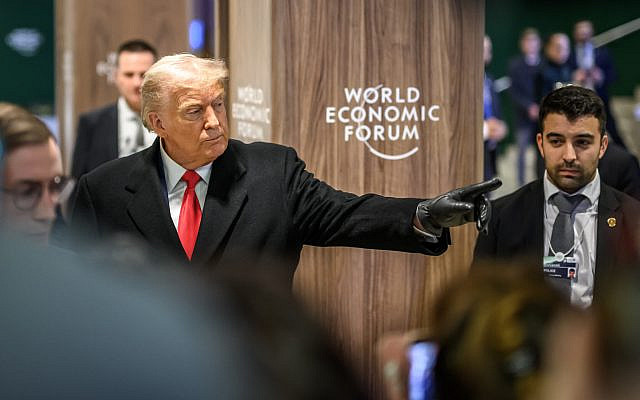 US President Donald Trump gestures as he leaves the congress centre during the World Economic Forum (WEF) annual meeting in Davos on January 21, 2026. (Fabrice COFFRINI / AFP)
