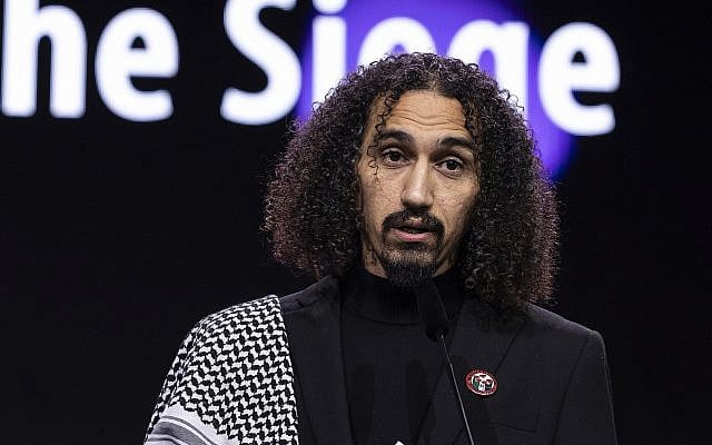 Abdallah Alkhatib, director of Chronicles From the Siege, accepts the GWFF Prize for Best First Feature at the 76th Berlin International Film Festival in Berlin, Germany, in 2026. Photo: Richard Hübner, Berlinale 2026