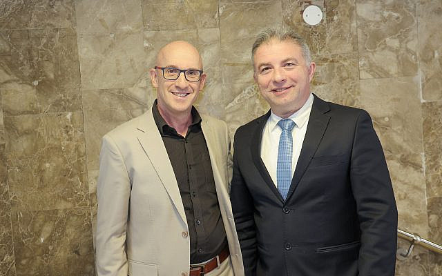 Ogen CEO Sagi Balasha and Israel’s Supervisor of Banks, Daniel Hahiashvili, at the Ogen Conference in December 2025. (Ronen Topelberg).