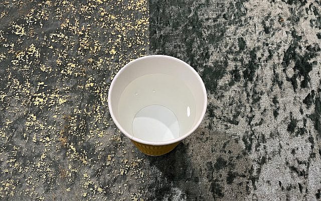 Cup of water at a Jewish wedding in New England. Photo - Shai Afsai