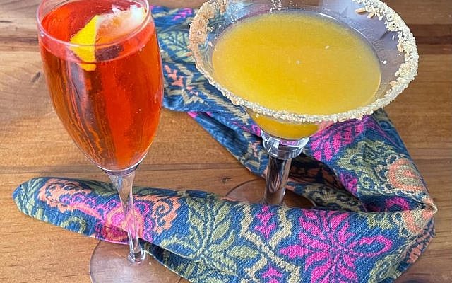Queen Esther Champagne Cocktail and Hammered Tsaschen Cocktail for Purim.  Photo courtesy of the author.