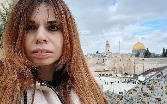 Earlier this year in Jerusalem, with the Kotel behind me and a part of my soul still there. Photo by Bonnie K. Goodman