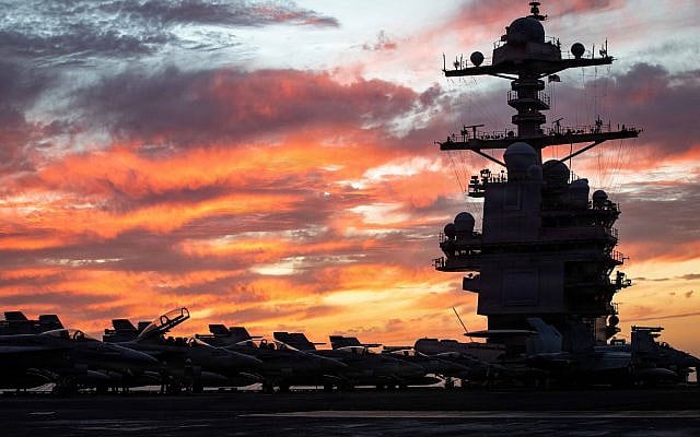 The world’s largest aircraft carrier, USS Gerald R. Ford (CVN 78), conducts flight deck operations during Operation Epic Fury, March 15, 2026.  (US Navy photo)