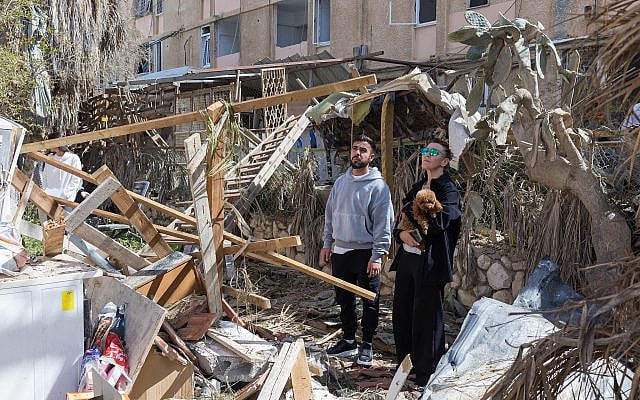 The scene where a missile fired from Iran toward Israel caused damage to residential buildings in the southern Israeli city of Dimona, March 22, 2026. (Liron Moldovan/Flash90)