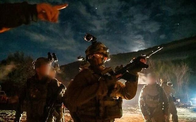 IDF troops of the 162nd Division operate in southern Lebanon, in a handout photo issued by the military on March 26, 2026. (Israel Defense Forces)