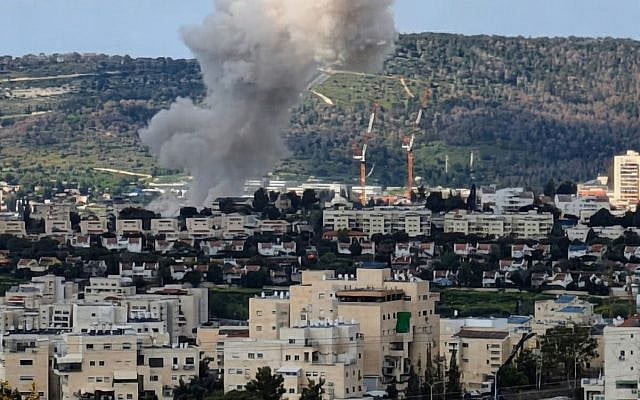 A plume of smoke rises from the Bet Shemesh neighborhood where an Iranian warhead destroyed a synagogue and several homes, killing 9 and injuring more than 40, on Sunday, March 1, 2026.