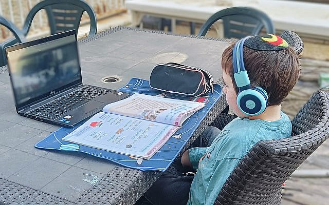My 6-year-old son participates in a remote school session due to the war. (courtesy)