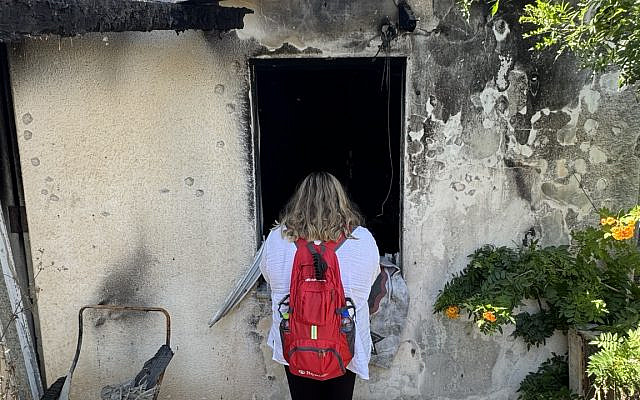 The author bearing witness at a destroyed neighborhoood within a kibbutz in the Gaza envelope, May 2024. The author bearing witness at a destroyed neighborhoood within a kibbutz in the Gaza envelope, May 2024.