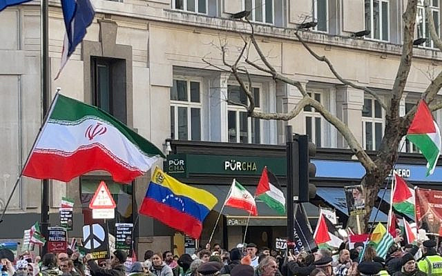 Protestors Wave Islamic Republic Flags and Ayatollah Photos at Pro-Palestine Rally (Photo: Author)