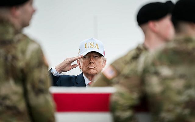 President Donald J. Trump attends transfer of remains of six US soldiers killed in an Iranian drone strike in Kuwait, March 7, 2026, at Dover Air Force Base, Delaware. Official White House photo by Daniel Torok, public domain.