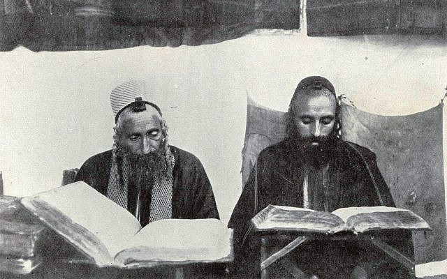 Jewish men studying the Torah in Sana'a, Yemen. Photograph by Hermann Burchadt. (via Wikimedia Commons)