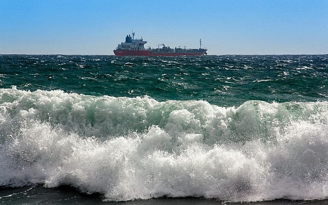 A commercial tanker transits waters central to global energy security
