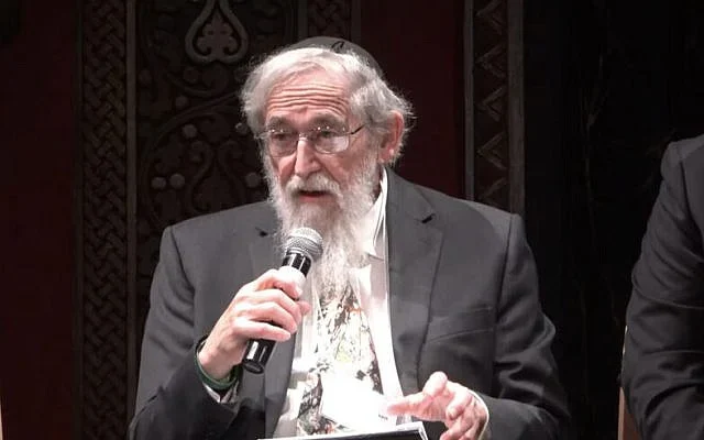 Rabbi Saul Berman presents the 'communal address' at the Smol Emuni conference on March 10, 2026. (Screenshot/ YouTube)