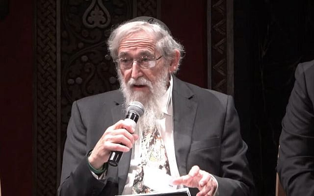 Rabbi Saul Berman presents the 'communal address' at the Smol Emuni conference on March 10, 2026. (Screenshot/ YouTube)