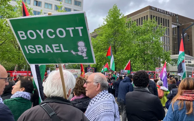 Demonstrators demanding the boycott of Israel during Olympic Games demonstrate outside the Paris Olympic organizing committee headquarters, April 30, 2024 in Saint-Denis, outside Paris. (AP Photo/Alexander Turnbull) Demonstrators demanding the boycott of Israel during Olympic Games demonstrate outside the Paris Olympic organizing committee headquarters, April 30, 2024 in Saint-Denis, outside Paris. (AP Photo/Alexander Turnbull)