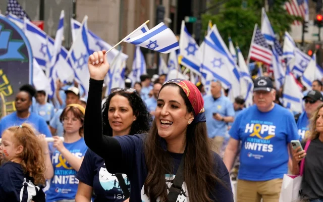 Celebrants march in the 2025 Israel Day Parade, on New York's Fifth Avenue, Sunday, May 18, 2025. (AP Photo/Richard Drew)