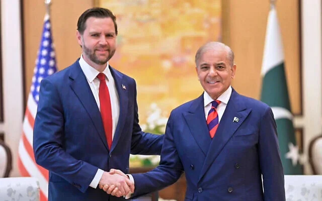 US Vice President JD Vance, left, shakes hands with Pakistani Prime Minister Shehbaz Sharif prior to their meeting in Islamabad, Pakistan, April 11, 2026 (Pakistan Prime Minister Office via AP)
