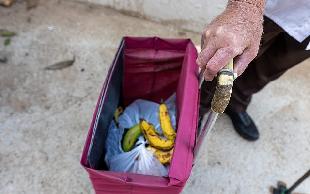 Volunteers give away food packages to elderly people in southern Tel Aviv, November 5, 2024. Photo by Dor Pazuelo/Flash90