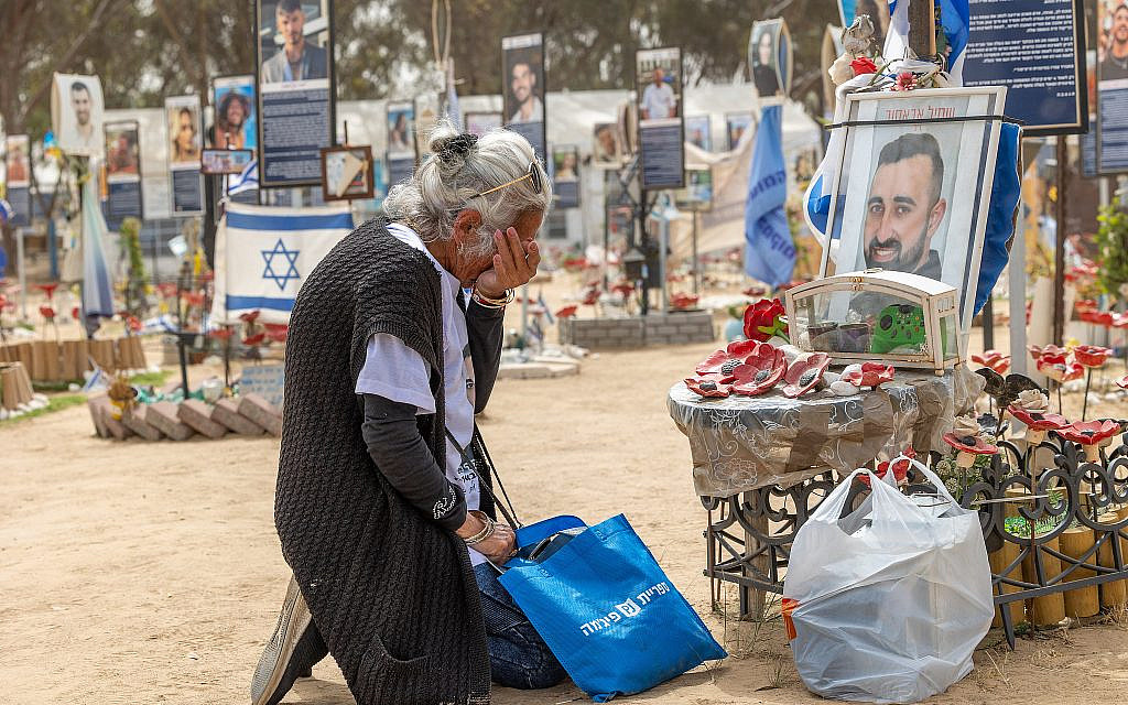 Bereaved families, friends and Israeli soldiers visit the site of the Nova music festival massacre during Memorial Day in Re'im forest, near the Israeli-Gaza border, April 30, 2025. (Yossi Aloni/Flash90)