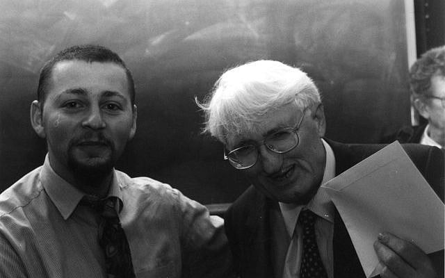 The German philosopher and professor, Jürgen Habermas, holding the yellow envelope given from Dimitris Eleas. Royal Institute of Philosophy, London 1998. Archive of D. Eleas. Photo by M. Galatoulas.
