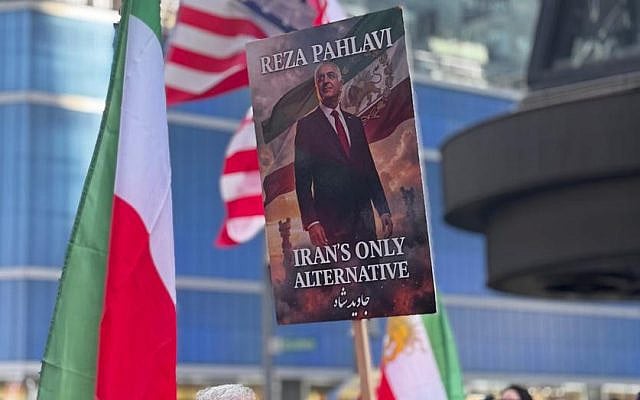 A sign calling for the the Pahlavi dynasty to reclaim leadership in Iran.