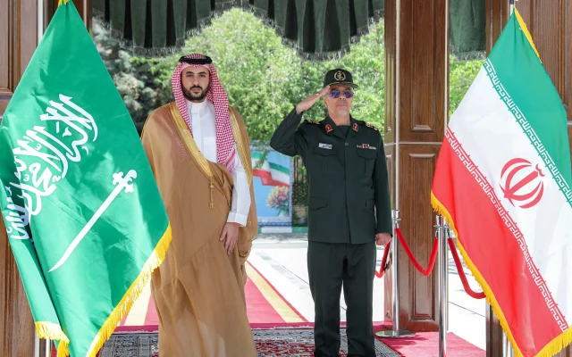 This handout photo made available by the Iranian Army Office on April 17, 2025 shows Iran's Armed Forces Chief of Staff Major-General Mohammed Bagheri (R) receiving Saudi Arabia's Defence Minister Prince Khalid bin Salman in Tehran on April 17, 2025. (Photo by Iranian Army Office / AFP)