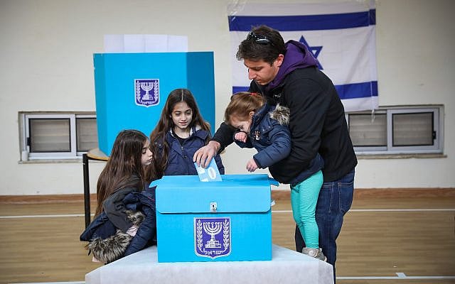 People cast their ballot at a voting station in Jerusalem, during the Knesset Elections, on March 2, 2020. Photo by Olivier Fitoussi/Flash90
