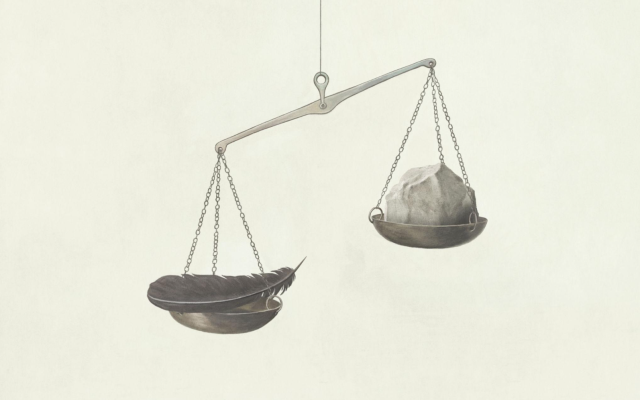 Scale showing a feather outweighing a stone