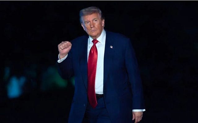 US President Donald Trump waves to reporters as he walks on the South Lawn upon his arrival to the White House, May 8, 2026, in Washington. (AP/Jose Luis Magana)