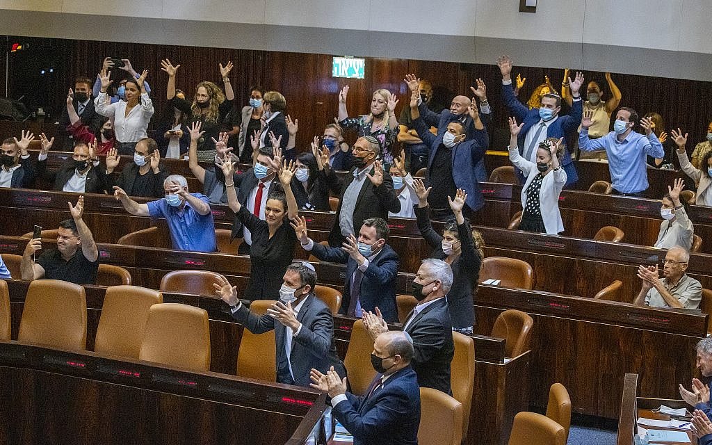 Shirley Pinto is applauded in sign language by members of parliament during a plenum session in the assembly hall of the Israeli parliament, on July 12, 2021. (Photo by Olivier Fitoussi/Flash90)